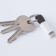The inCharge wraps around your keychain, and stays in place solely through the power of magnets. The result is incredibly small and minimal, but with a chance of falling off without you noticing.